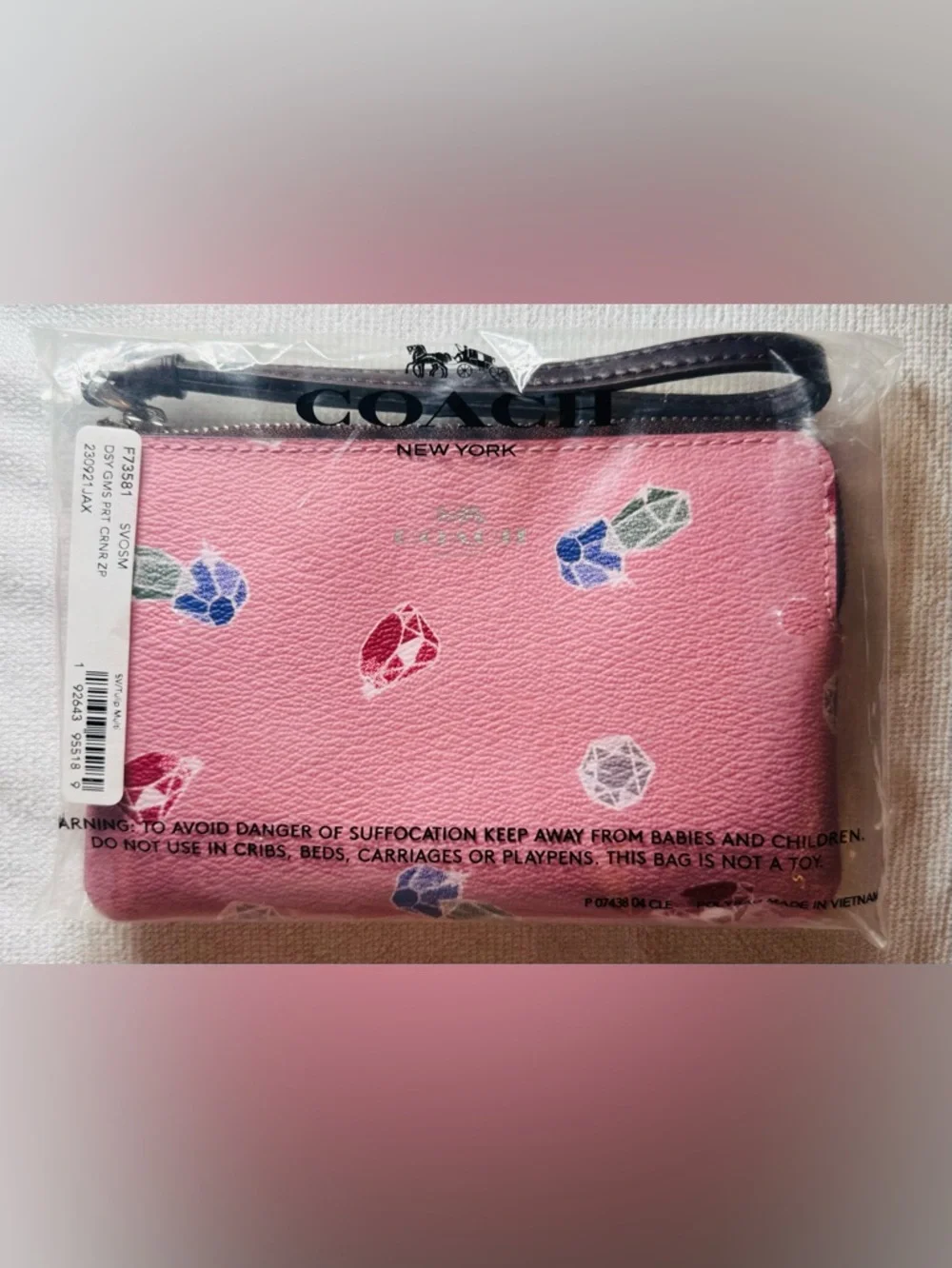 Coach Disney Pink Gem-Print  Wristlet